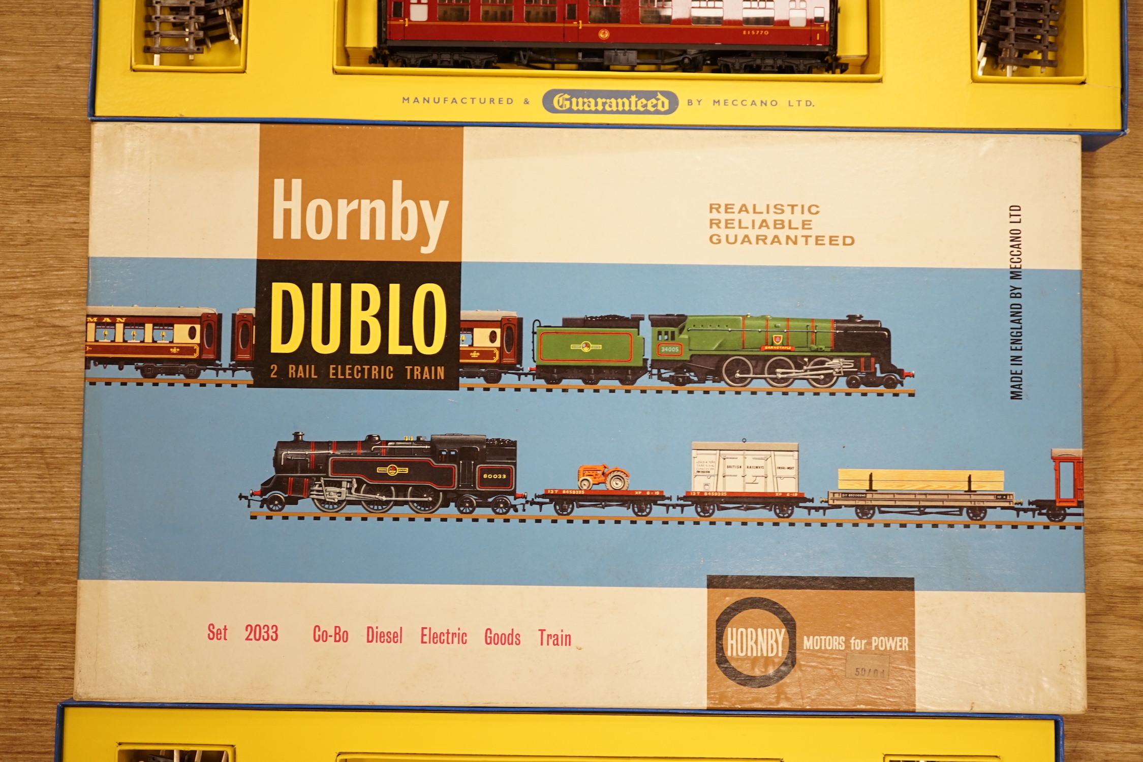 Two boxed Hornby Dublo 2-rail train sets; Set 2014 ‘The Tallisman’ Passenger train set and Set 2033 Co-Bo Diesel Electric Goods Train set